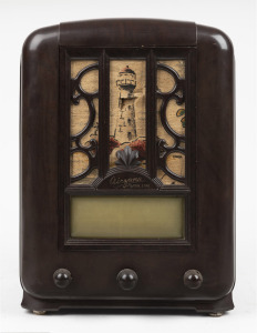 AIRZONE "RADIO STAR" vintage mantle radio in tombstone brown bakelite case, 36cm high.