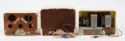 Three assorted cream and white bakelite cased mantle radios, ​​​​​​​the largest 17cm high. - 2