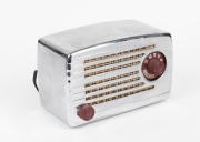 A vintage American shelf radio in chrome plated metal case, retailed by SEARS, ROEBUCK & Co. ​​​​​​​13cm high.