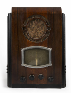 S.T.C. vintage tombstone mantle radio in walnut case with ebonized highlights, 41cm high.
