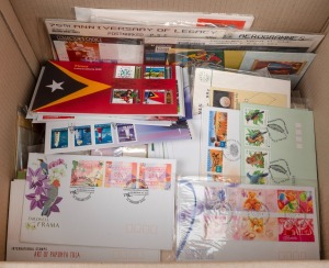 A box containing mainly c. 1990s-2000s first day covers (hundreds), in addition to a quantity of prepaid postcards and envelopes.