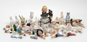Collection of assorted miniature ornaments, pie funnels, bisque piano dolls etc., (qty).