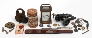 Badges, medallions, medals, antique padlocks, antique alarm clock, toy cannon, "Two-Up" set, paper knife and Edison cylinder roll, 19th and 20th century, (qty).