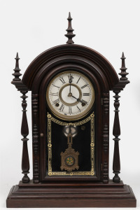 An antique American mantle clock in rosewood case with eight day time and gong strike movement, 19th century, ​​​​​​​59cm high.