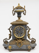 An antique French mantle clock in ornate grey marble case with ormolu mounts, eight day time and strike movement, with later Roman numerals applied, 19th century, 41cm high.