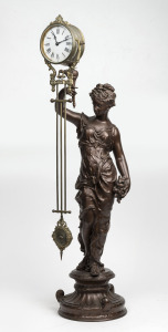 An antique French figural swinging mystery clock, patinated spelter on ebonized base, 19th century, ​​​​​​​85cm high.