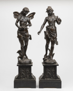 A pair of antique French patinated spelter and black slate clock garniture statues, 19th century, 50cm and 51cm high.
