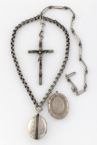 Antique silver crucifix on silver fob chain, together with two antique silver lockets, one on a silver chain, 19th/20th century,