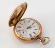 An antique French 15ct gold full hunter cased pocket watch with crown wind and engraved decoration, 19th century, 7cm high including bow, 73 grams total including movement.