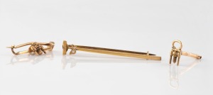 An antique 15ct gold bar brooch, set with two seed pearls; together with two antique gold clasps (parts), (3 items), the brooch 4.8cm wide, 5 grams total.