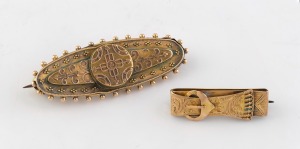An antique 15ct gold brooch (5.1 grams); together with an 18ct yellow gold buckle brooch (2.5 grams), 19th century, (2 items), the larger 4.2cm wide, 7.6 grams total.