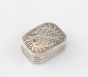 An antique sterling silver vinaigrette with engraved decoration and gilt wash interior and grill (note: grill hinge loose), made in Birmingham, circa 1807, 2.4cm wide.