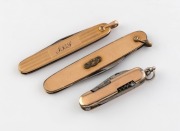 Two gold plated pocketknives together with an attractive gold plated miniature multi-tool pocket knife, early 20th century, (3 items), ​​​​​​​the multi-tool 5cm long when closed.