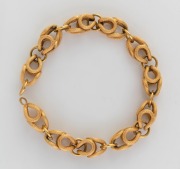 A vintage 18ct gold bracelet with serpent scale finish, 20th century, note: missing clasp, stamped "750", ​​​​​​​22cm long, 17.8 grams.