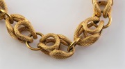 A vintage 18ct gold bracelet with serpent scale finish, 20th century, note: missing clasp, stamped "750", ​​​​​​​22cm long, 17.8 grams. - 2