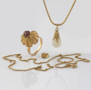 A 14ct gold and ruby ring, A/F, (5.8 grams), together with two Italian 9ct gold chains (8.4 grams), and a gold mounted glass orb pendant with opal chips (1.6 grams), (4 items), ​​​​​​​15.8 grams total.