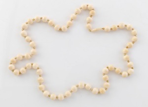 A vintage carved ivory bead necklace, early to mid 20th century, 70cm long.