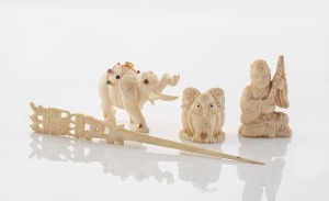 A carved ivory elephant pendant, mounted in 14ct gold with rubies, emeralds and sapphires; together with a carved ivory owl ornament, a carved ivory figural ornament and a carved bone cocktail stick, mixed vintages and origins, (4 items), the elephant pen