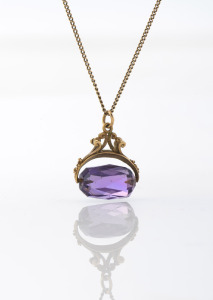 A fine antique 9ct gold chain with purple stone swivel fob pendant, 19th/20th century, the chain 50cm long, 5.2 grams total including stone.
