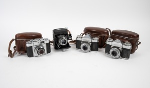 ZEISS IKON: Group comprising one c. 1938 Ikonta 521 (A, vertical), one c. 1956 Contina II (527/24, in Zeiss Ikon leather case), and two different c. 1958 Contaflex Alpha variants (both in Zeiss Ikon leather cases). (4 items)