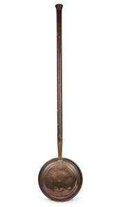 An antique copper bed warmer with turned timber handle, 19th century, ​​​​​​​122cm long.