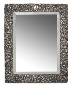 An antique English sterling silver table mirror with ornate floral repousse decoration, late 19th century, ​​​​​​​30.5 x 24.5cm.