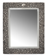 An antique English sterling silver table mirror with ornate floral repousse decoration, late 19th century, ​​​​​​​30.5 x 24.5cm.
