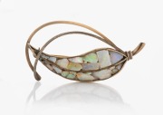 A vintage Australian silver and opal brooch in the form of a gum leaf, mid 20th century, ​​​​​​​5.5cm wide.