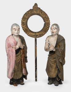 A pair of antique Chinese polychrome Buddhist statues in relic condition with losses, 18th/19th century, 49cm and 48cm high.