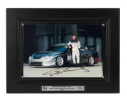 CRAIG LOWNDES - 2001: A unique collection of eleven different framed and glazed signed action photographs of Lowndes and his Gibson Motorsport AU XR8 Falcon, all numbered 00/100, each 33 x 43cm overall. (11 items)