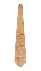 VICTORIA v QUEENSLAND 1946: Wooden paddle signed by fifteen players including Jack Ryder, Des Fothergill, Bill Johnston, and Keith Stackpole Sr.; length 45cm.