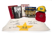 Group of clothing items signed by prominent cricketers including Greg Chappell, Waqar Younis, David Hookes, and Keith Stackpole, together with three unsigned cricket books, plus two Moto GP books (both signed by Eddie Lawson and Wayne Gardner). (8 items)