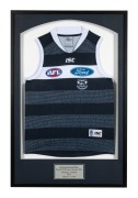 GEELONG: A round 22 2013 member's jumper, featuring a montage of players' names, together with the AFL, Ford, and Geelong Cats logos; framed and glazed, 101 x 67cm overall.