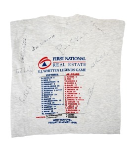 INAUGURAL E.J. WHITTEN LEGENDS GAME: Official t-shirt from the game played at the Whitten Oval on May 31st 1996, bearing eight signatures, including those of three members of the Whitten family, David Rhys-Jones, Mal Brown, and others, as well as a list of that day's players and umpires; producer named as "East Coast" on tag.