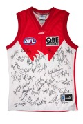 AFL "On-Field Team Gear" Sydney Swans guernsey, signed by more than forty members of the c. 2000 Swans roster, including Paul Kelly, Adam Goodes, Andrew Schauble, and others.