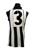 1964 COLLINGWOOD GUERNSEY: Short-sleeved guernsey with tag that reads "A Mascot Production Made Expressly For Meret - Thorold Merrett's Sports Store Melbourne", number 3 stitched in vinyl on back panel. Ken Turner played as number 3 for Collingwood in tha