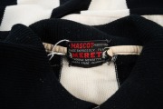 1964 COLLINGWOOD GUERNSEY: Short-sleeved guernsey with tag that reads "A Mascot Production Made Expressly For Meret - Thorold Merrett's Sports Store Melbourne", number 3 stitched in vinyl on back panel. Ken Turner played as number 3 for Collingwood in tha - 3