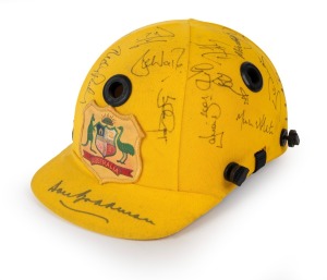167 · 1992 Australian One Day International team batting helmet with Australian Coat of Arms to front panel, signed in pen by numerous cricketing greats present at the match, including Don Bradman, Greg Chappell, David Boon, Glenn McGrath, Ian Healy, Mark Taylor, Ricky Ponting, Phil Emery, Mark Waugh, and others. Match worn; player unknown.