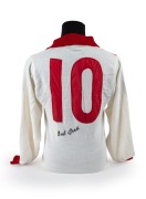 BOB PRATT: 1975 long-sleeved South Melbourne Swans VFL guernsey (with Sherwood Royal maker's label), number 10 on back, signed by Pratt on both front and back. Likely originally belonged to Brian Woodman, who wore that player number at this time.