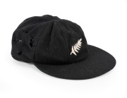 RICHARD HADLEE - NEW ZEALAND TEST CAP: Circa 1980s New Zealand black cloth Test Team cap, manufacturer "Westminster By Freister", with embroidered "silver fern" emblem of New Zealand to front. The cap has been signed by Hadlee to the inside. Hadlee played - 2