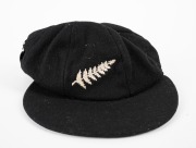 RICHARD HADLEE - NEW ZEALAND TEST CAP: Circa 1980s New Zealand black cloth Test Team cap, manufacturer "Westminster By Freister", with embroidered "silver fern" emblem of New Zealand to front. The cap has been signed by Hadlee to the inside. Hadlee played - 3