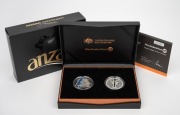 ANZAC CENTENARY: 2015 RAM/New Zealand Post joint issue two-coin proof set, comprising triangular 22.23g silver Australian $5 coin together with 1oz silver New Zealand 50c piece; offered in presentation case with box and CoA.