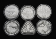 Group of six RAM one dollar 1oz silver coins, all in coin capsules, comprising 2020 Beneath The Southern Skies, 2021 Zeewijk Shipwreck, 2021 Australia Zoo Cheetah, 2021 Fraser's Dolphin, 2022 Dusky Dolphin, and 2022 Australian Coat of Arms - NSW. (6).