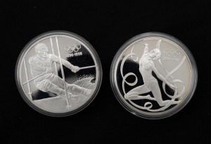 Austria: 1995 200sch silver Proof pair produced for the IOC Centennial 1896-1996 Series - Gymnast and Skier, (2).