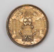 GERMAN STATE: AUGSBURG, silver gilt wedding medal, by Phillip Heinrich Mueller, circa 1700, (50mm, 44g) depicting two newlyweds under a tree with vine branches, chained and exchanging hearts; at their feet, two demons. - 2
