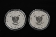 Cameroon: SILVER PROOFS - SHROUD OF TURIN: Two 2010 "Le Suaire De Turin" 1000 CFA franc coins, each 20g sterling silver with holographic accent, both in coin capsules, with one CoA. (2). - 2
