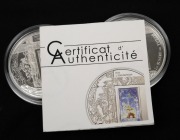 Cameroon: SILVER PROOFS - SHROUD OF TURIN: Two 2010 "Le Suaire De Turin" 1000 CFA franc coins, each 20g sterling silver with holographic accent, both in coin capsules, with one CoA. (2). - 3