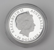 DISCOVER AUSTRALIA - PLATINUM: Perth Mint 2009 &frac12;oz Dolphin $50 platinum proof, P mint mark, in coin capsule. - 2