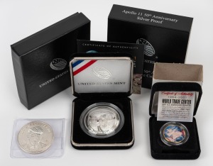 United States of America: APOLLO 11: United States Mint 2019 50th Anniversary commemorative silver proof in presentation case with box and CoA, together with 2001 World Trade Center U.S. Statehood Quarter and Donald J. Trump 2016 1oz silver round. (3 item