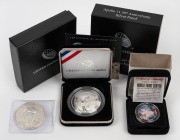 United States of America: APOLLO 11: United States Mint 2019 50th Anniversary commemorative silver proof in presentation case with box and CoA, together with 2001 World Trade Center U.S. Statehood Quarter and Donald J. Trump 2016 1oz silver round. (3 item